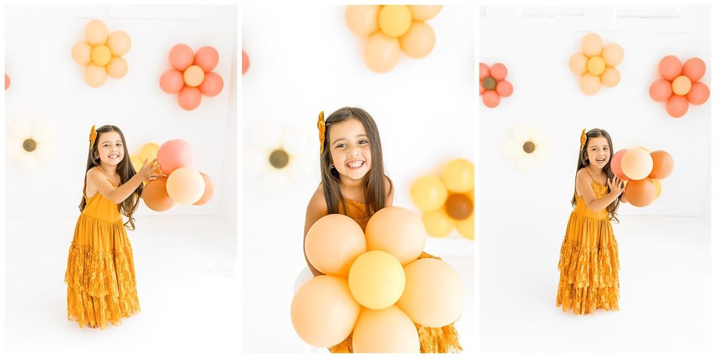 girl dancing with flower balloons
