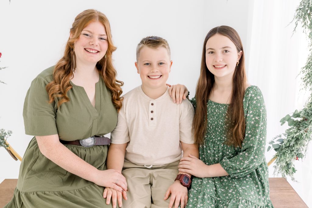 siblings during christmas mini session