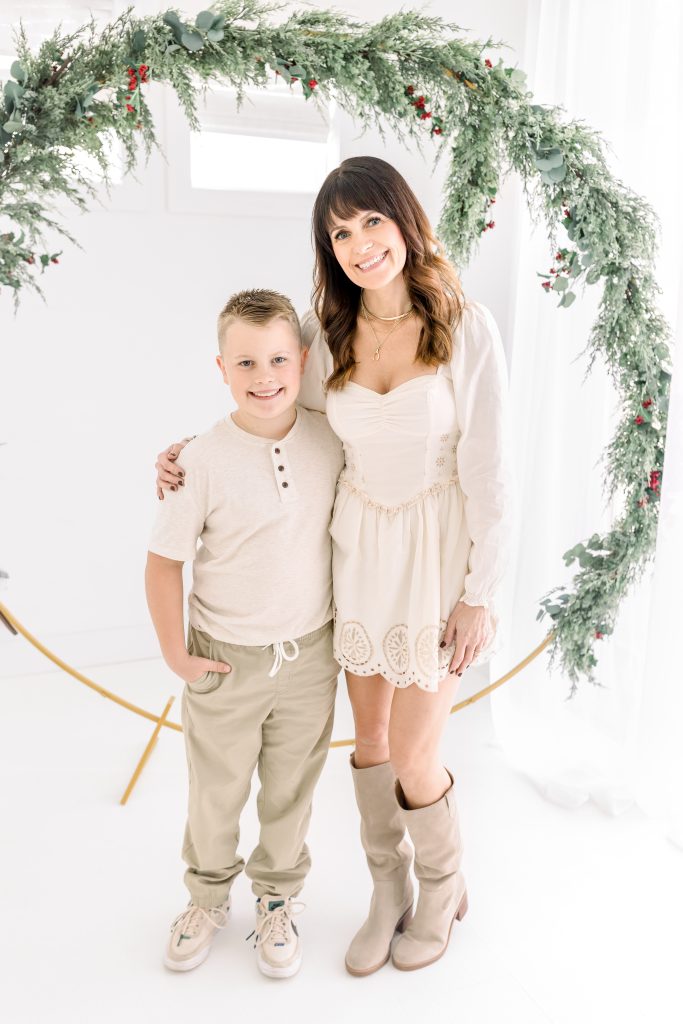 mom and son pose for holiday card photo session