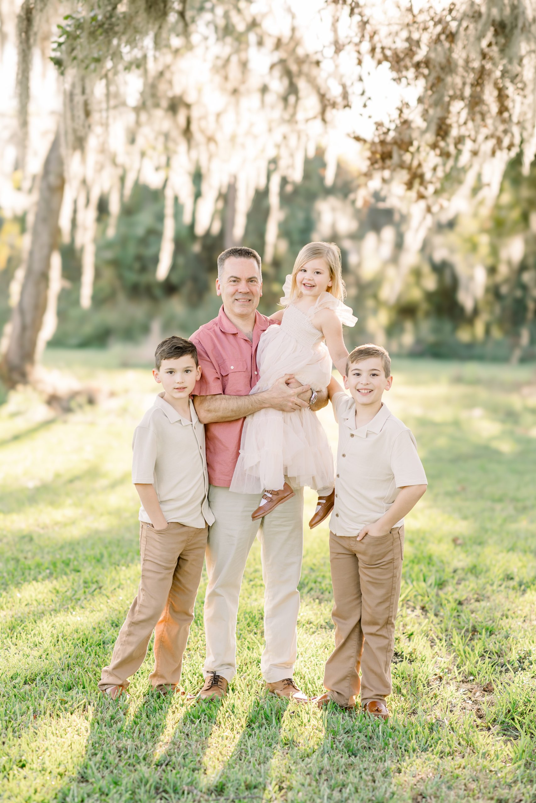 dad smiling with children