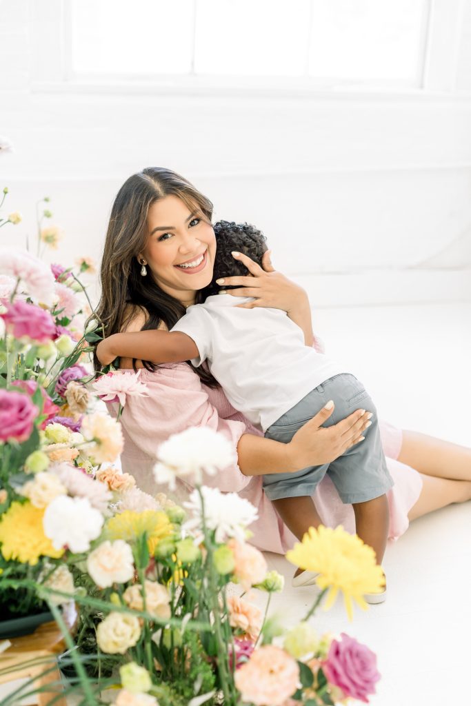 mom hugging son for mothers day mini session